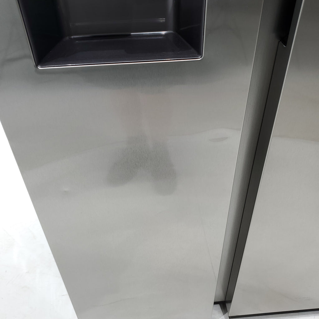 Pictures of Fingerprint Resistant Stainless Steel ENERGY STAR Samsung 27.4 cu. ft. Side by Side Refrigerator with Exterior Water and Ice Dispenser - Scratch & Dent - Moderate - Neu Appliance Outlet - Discount Appliance Outlet in Austin, Tx