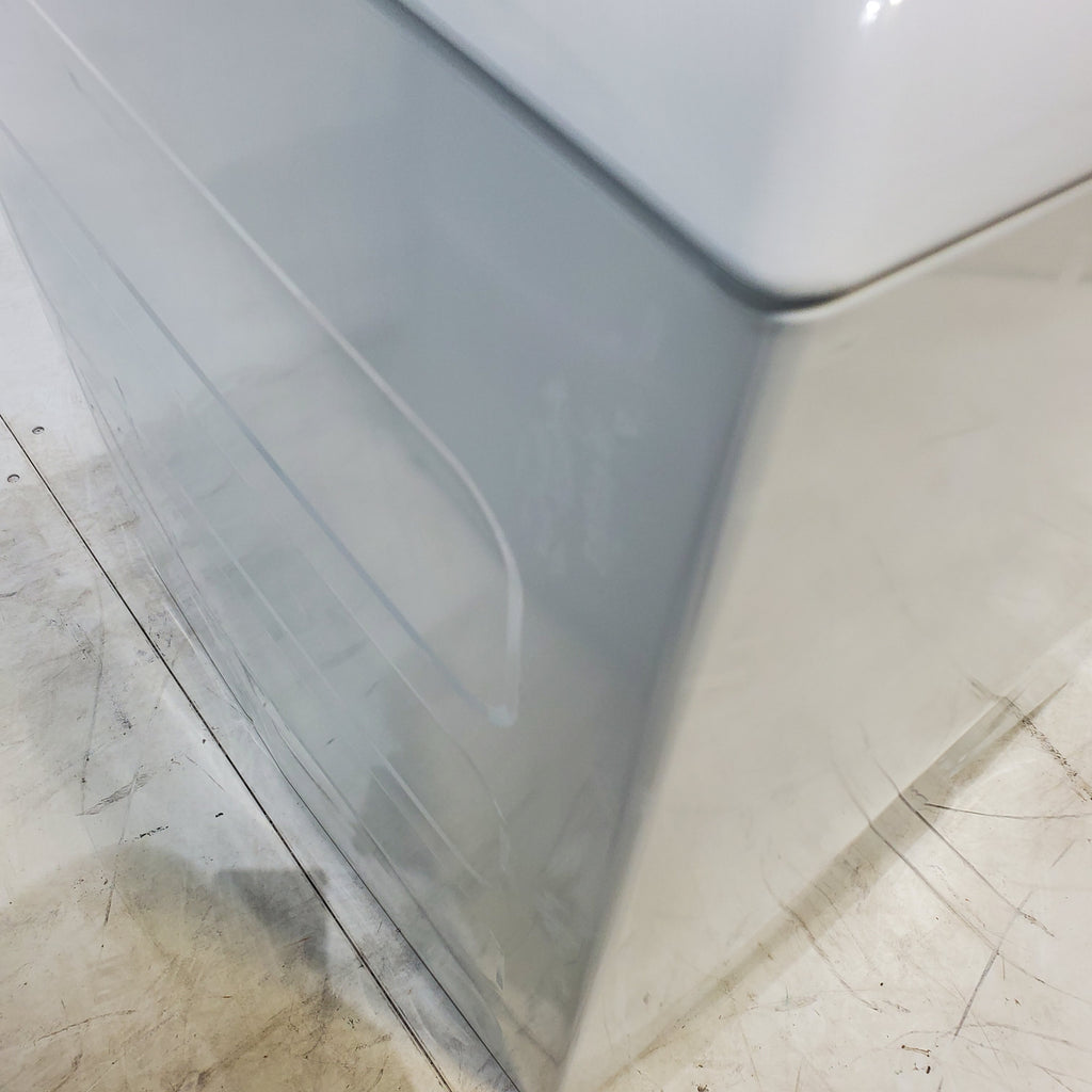 Pictures of ENERGY STAR GE  4.4 cu. ft. Top Load Washing Machine with Infusor Wash System and 7.2 cu. ft. Electric Dryer with HE Sensor Dry - Certified Refurbished - Neu Appliance Outlet - Discount Appliance Outlet in Austin, Tx