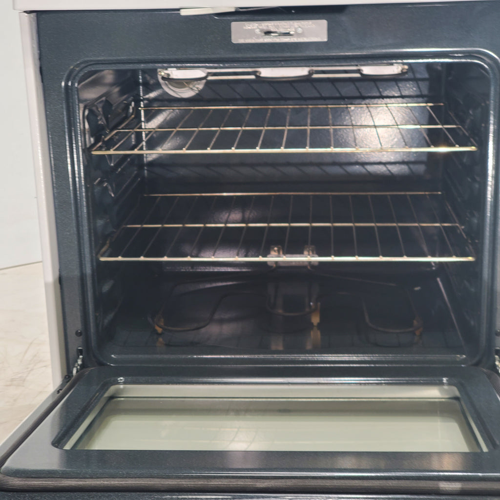 Pictures of White GE 5.3 cu. ft. Freestanding 4 Element Electric Range with Dual Element Baking and Self-Cleaning Oven- Certified Refurbished - Neu Appliance Outlet - Discount Appliance Outlet in Austin, Tx