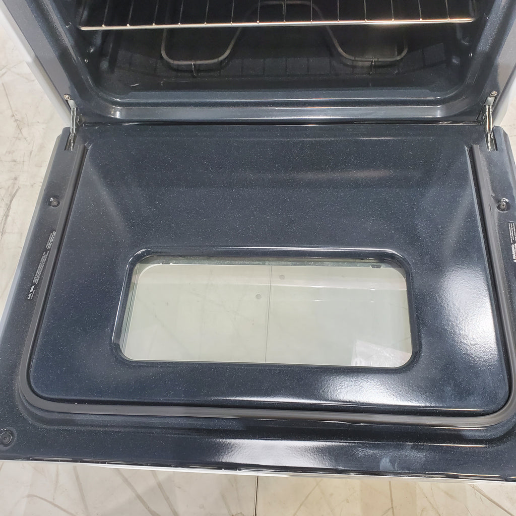 Pictures of White GE 5.0 cu. ft. Freestanding 4 Heating Element Electric Range with Dual Element Bake - Certified Refurbished - Neu Appliance Outlet - Discount Appliance Outlet in Austin, Tx