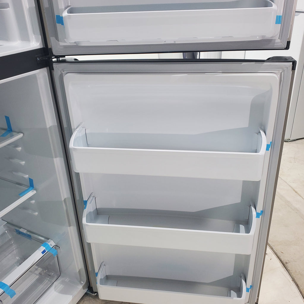 Pictures of 30" Wide Easy Care Stainless Steel Frigidaire 18.3 cu. ft. Top Freezer Bottom Refrigerator with EvenTemp Cooling System - Scratch and Dent - Minor - Neu Appliance Outlet - Discount Appliance Outlet in Austin, Tx