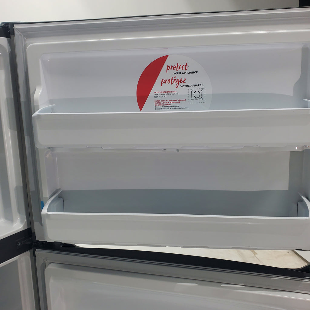 Pictures of 30" Wide Easy Care Stainless Steel Frigidaire 18.3 cu. ft. Top Freezer Bottom Refrigerator with EvenTemp Cooling System - Scratch and Dent - Minor - Neu Appliance Outlet - Discount Appliance Outlet in Austin, Tx