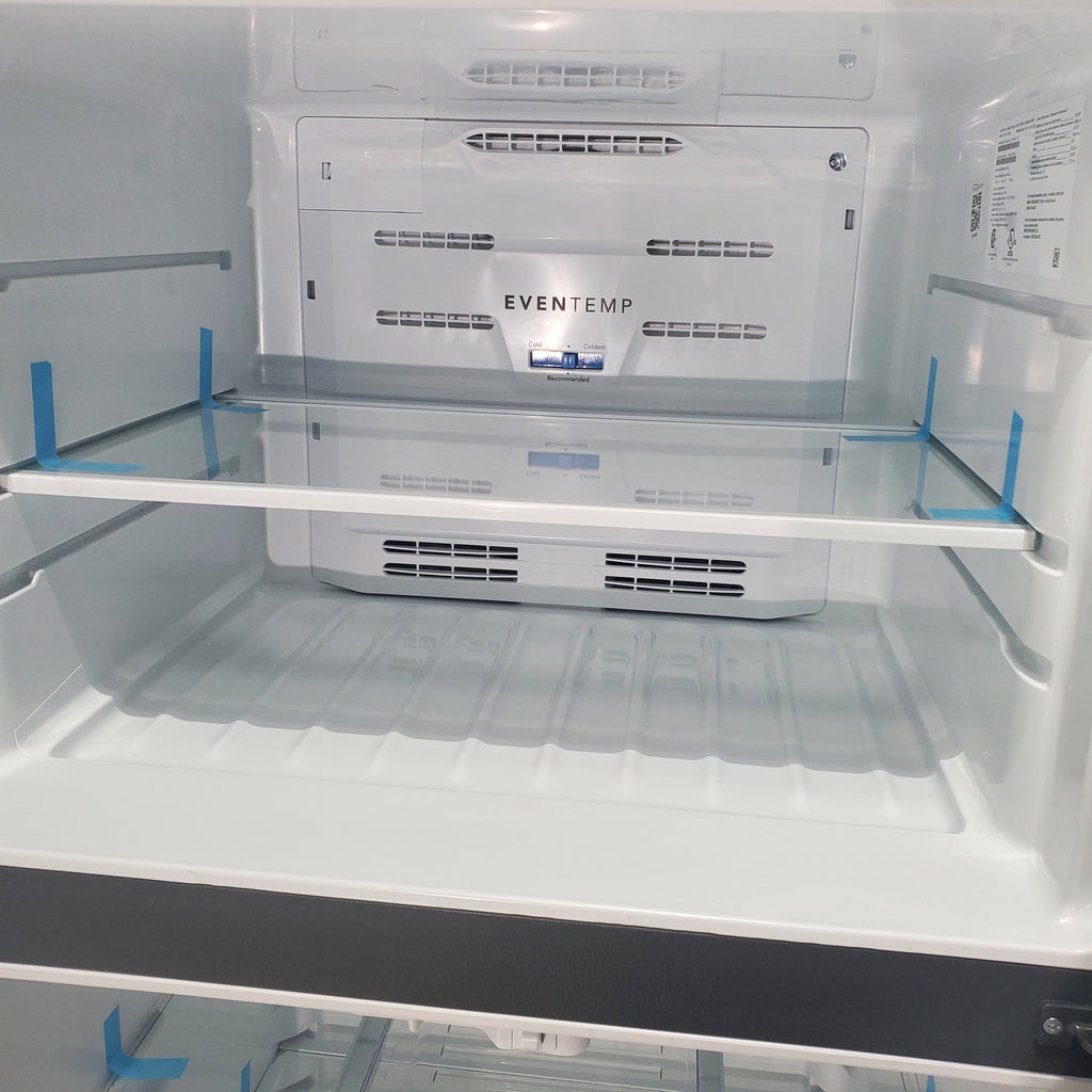 Pictures of 30" Wide Easy Care Stainless Steel Frigidaire 18.3 cu. ft. Top Freezer Bottom Refrigerator with EvenTemp Cooling System - Scratch and Dent - Minor - Neu Appliance Outlet - Discount Appliance Outlet in Austin, Tx