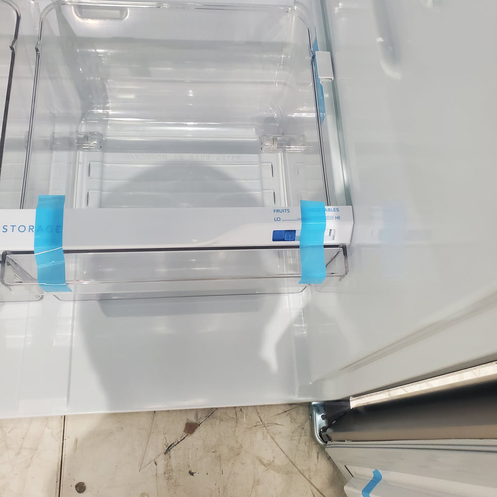 Pictures of 30" Wide Easy Care Stainless Steel Frigidaire 18.3 cu. ft. Top Freezer Bottom Refrigerator with EvenTemp Cooling System - Scratch and Dent - Minor - Neu Appliance Outlet - Discount Appliance Outlet in Austin, Tx