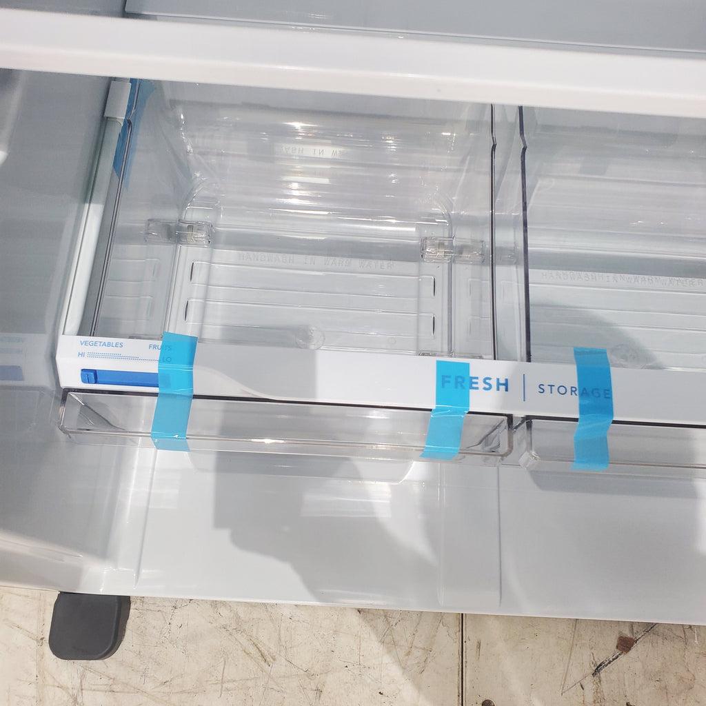 Pictures of 30" Wide Easy Care Stainless Steel Frigidaire 18.3 cu. ft. Top Freezer Bottom Refrigerator with EvenTemp Cooling System - Scratch and Dent - Minor - Neu Appliance Outlet - Discount Appliance Outlet in Austin, Tx