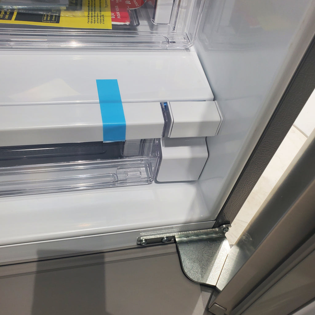 Pictures of Stainless Steel ENERGY STAR Frigidaire 27.8 cu. ft. 3 Door French Door Refrigerator with Exterior Water and Ice Dispenser - Scratch & Dent - Minor - Neu Appliance Outlet - Discount Appliance Outlet in Austin, Tx