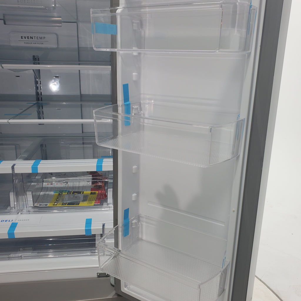 Pictures of Stainless Steel ENERGY STAR Frigidaire 27.8 cu. ft. 3 Door French Door Refrigerator with Exterior Water and Ice Dispenser - Scratch & Dent - Minor - Neu Appliance Outlet - Discount Appliance Outlet in Austin, Tx