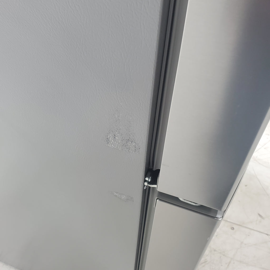Pictures of Stainless Steel ENERGY STAR Frigidaire 27.8 cu. ft. 3 Door French Door Refrigerator with Exterior Water and Ice Dispenser - Scratch & Dent - Minor - Neu Appliance Outlet - Discount Appliance Outlet in Austin, Tx