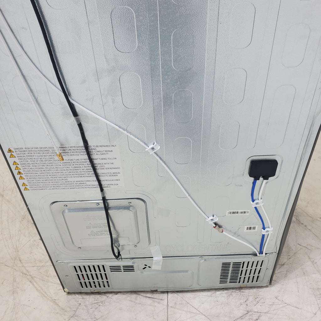 Pictures of Hisense Fingerprint Resistant Stainless Steel Counter-depth 21.2 cu ft French Door ENERGY STAR Refrigerator with Water and Ice Dispenser - Scratch & Dent - Moderate - Neu Appliance Outlet - Discount Appliance Outlet in Austin, Tx