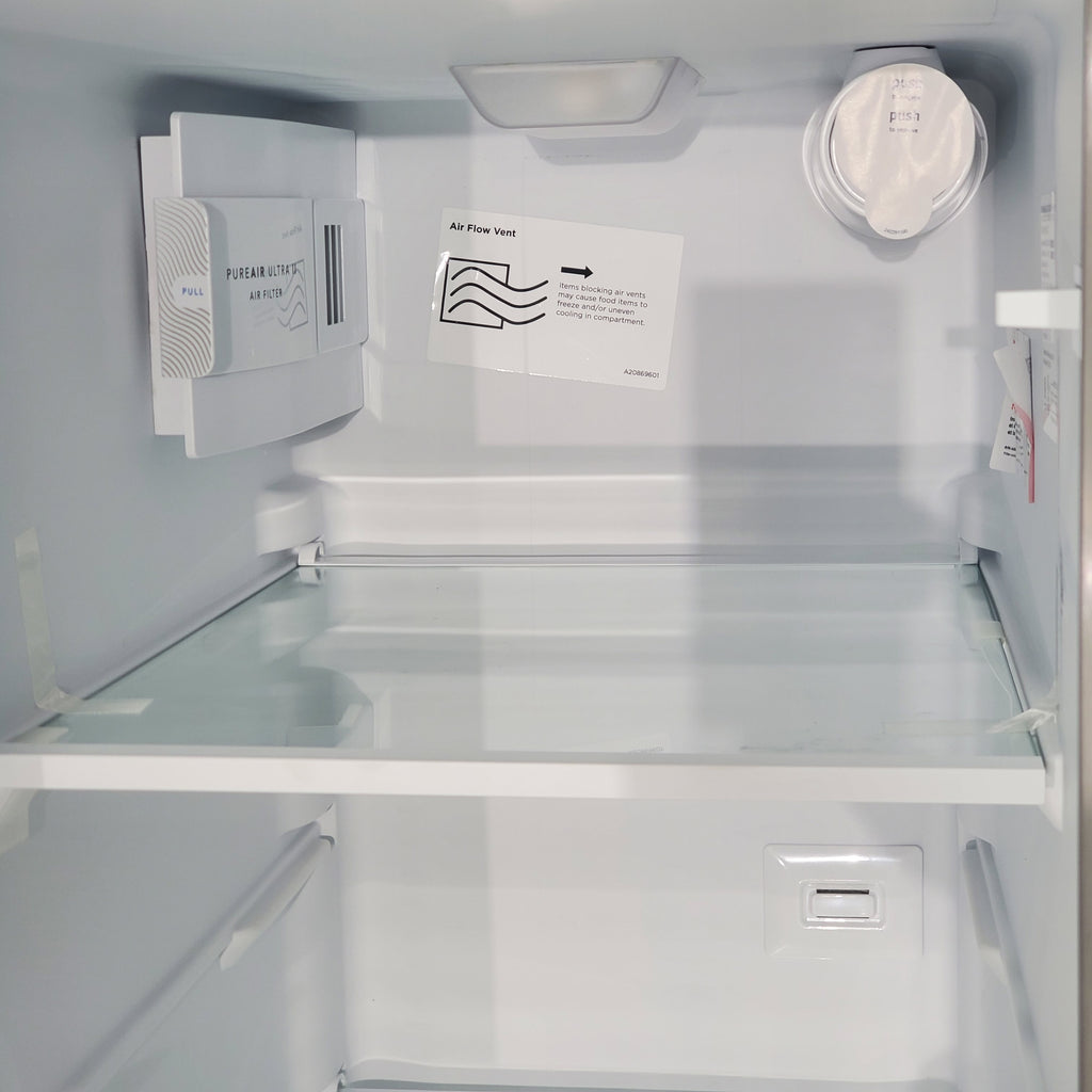 Pictures of 33" Wide Stainless Steel Frigidaire 22.3 cu. ft. ENERGY STAR Side by Side Refrigerator with Exterior Water and Ice Dispenser - Scratch & Dent - Minor - Neu Appliance Outlet - Discount Appliance Outlet in Austin, Tx