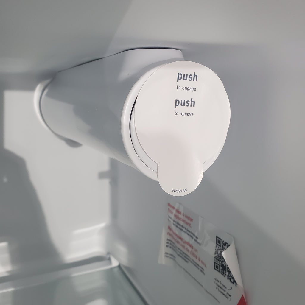 Pictures of 33" Wide Stainless Steel Frigidaire 22.3 cu. ft. ENERGY STAR Side by Side Refrigerator with Exterior Water and Ice Dispenser - Scratch & Dent - Minor - Neu Appliance Outlet - Discount Appliance Outlet in Austin, Tx