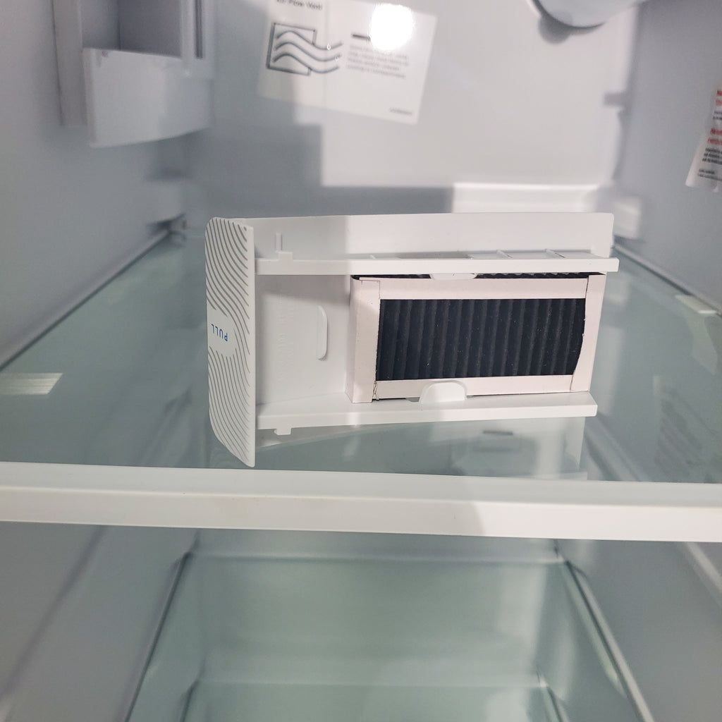 Pictures of 33" Wide Stainless Steel Frigidaire 22.3 cu. ft. ENERGY STAR Side by Side Refrigerator with Exterior Water and Ice Dispenser - Scratch & Dent - Minor - Neu Appliance Outlet - Discount Appliance Outlet in Austin, Tx