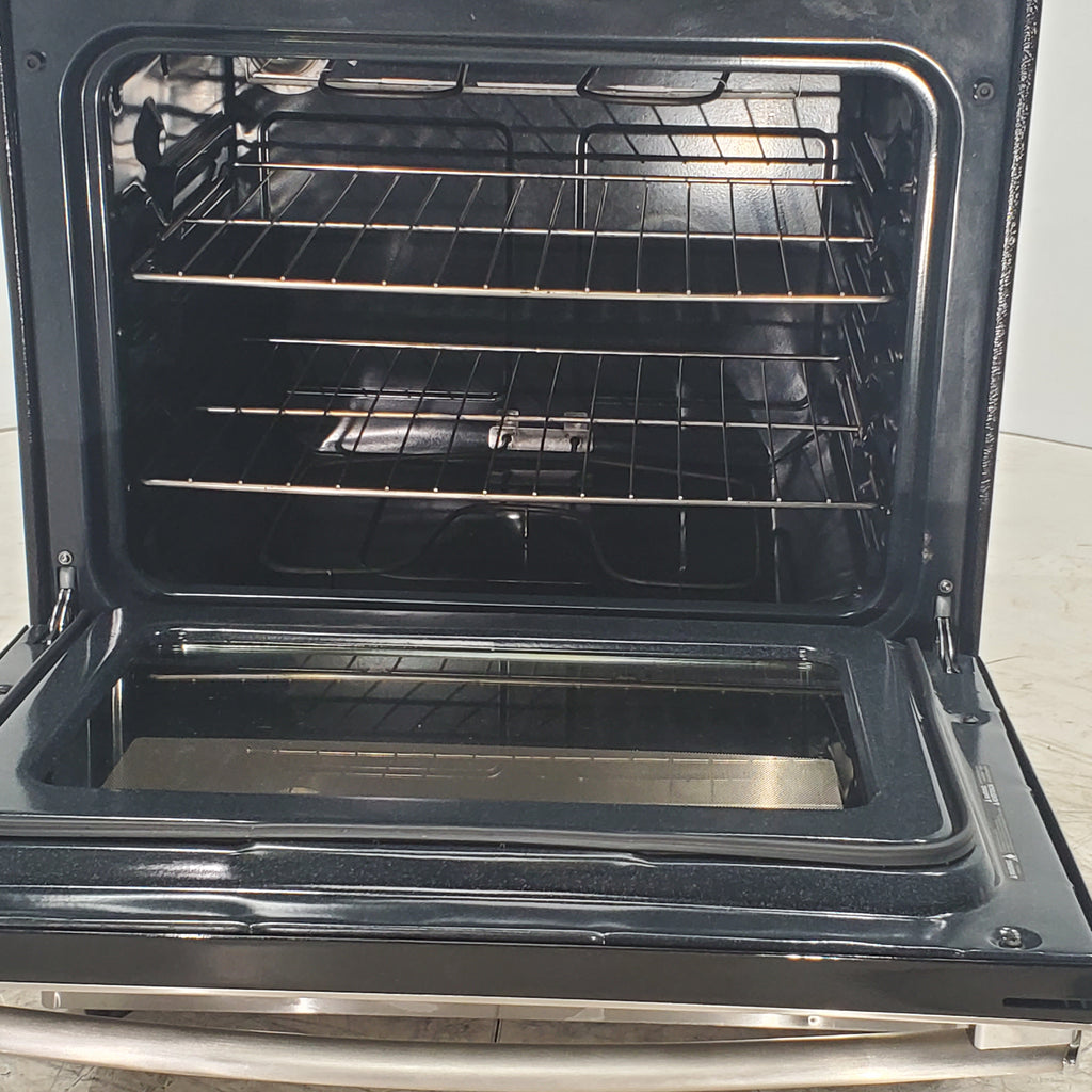 Pictures of Black with Stainless Steel GE 5.0 cu. ft. Freestanding 4 Element Electric Range with Sensi-Temp Technology - Certified Refurbished - Neu Appliance Outlet - Discount Appliance Outlet in Austin, Tx
