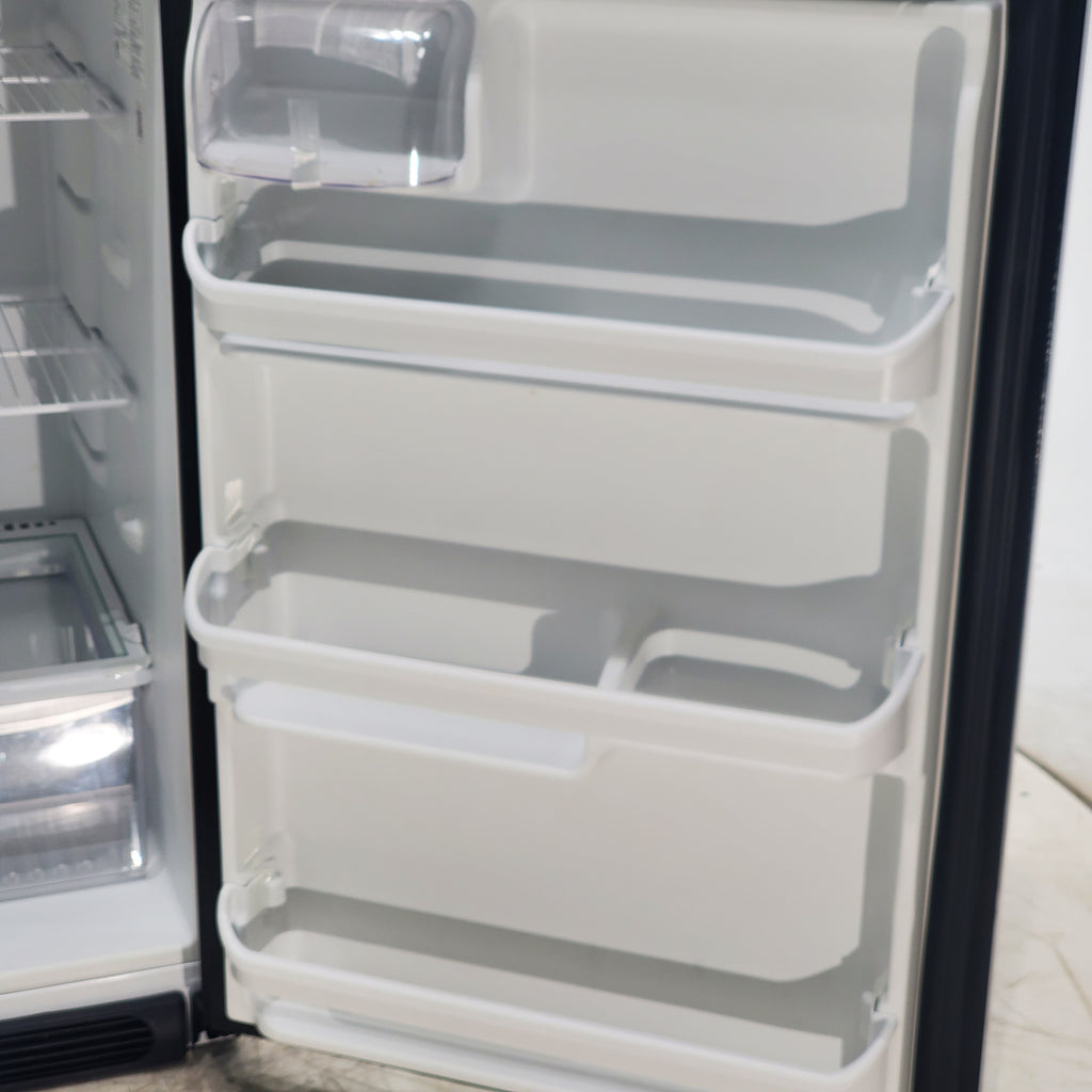 Pictures of 30 in. Wide Black Frigidaire 18 cu. ft. Top Freezer Refrigerator with Reversible Doors - Certified Refurbished - Neu Appliance Outlet - Discount Appliance Outlet in Austin, Tx