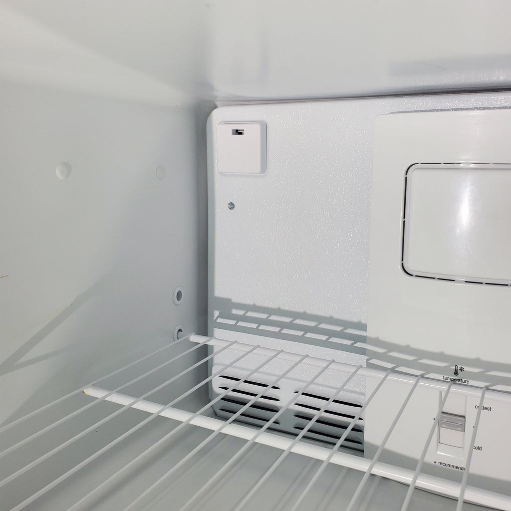 Pictures of 30 in. Wide Black Frigidaire 18 cu. ft. Top Freezer Refrigerator with Reversible Doors - Certified Refurbished - Neu Appliance Outlet - Discount Appliance Outlet in Austin, Tx