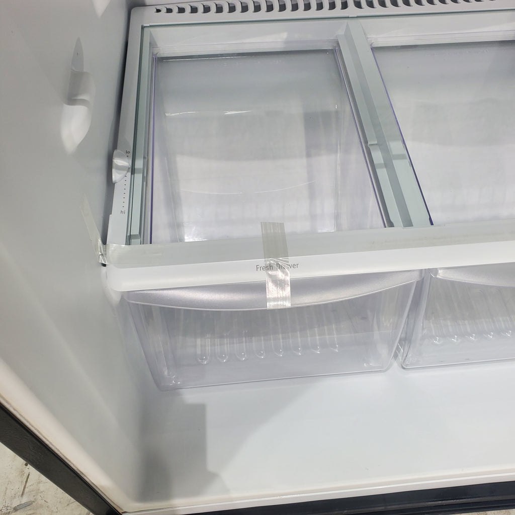 Pictures of 30 in. Wide Black Frigidaire 18 cu. ft. Top Freezer Refrigerator with Reversible Doors - Certified Refurbished - Neu Appliance Outlet - Discount Appliance Outlet in Austin, Tx