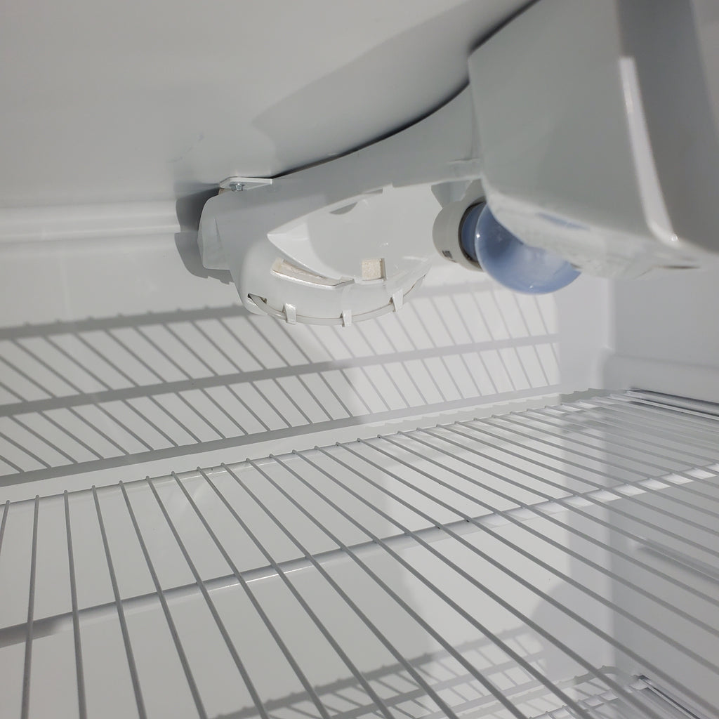 Pictures of 30 in. Wide Black Frigidaire 18 cu. ft. Top Freezer Refrigerator with Reversible Doors - Certified Refurbished - Neu Appliance Outlet - Discount Appliance Outlet in Austin, Tx