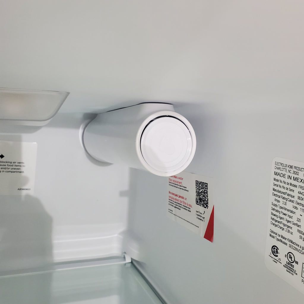 Pictures of 33" Wide Stainless Steel Frigidaire 22.3 cu. ft. ENERGY STAR Side by Side Refrigerator with Exterior Water and Ice Dispenser - Scratch & Dent - Minor - Neu Appliance Outlet - Discount Appliance Outlet in Austin, Tx