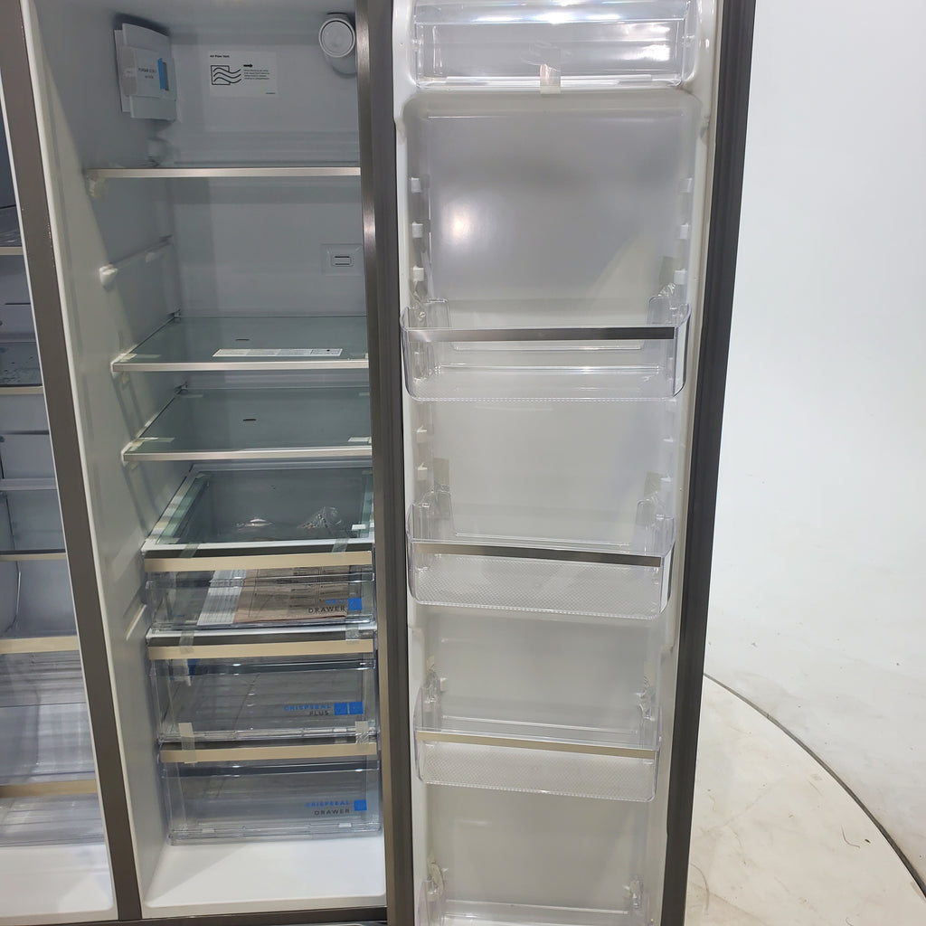 Pictures of Smudge Proof Stainless Steel ENERGY STAR Frigidaire Gallery 25.6 cu. ft. Side by Side Refrigerator with Exterior Water and Ice Dispenser - Scratch & Dent - Minor - Neu Appliance Outlet - Discount Appliance Outlet in Austin, Tx