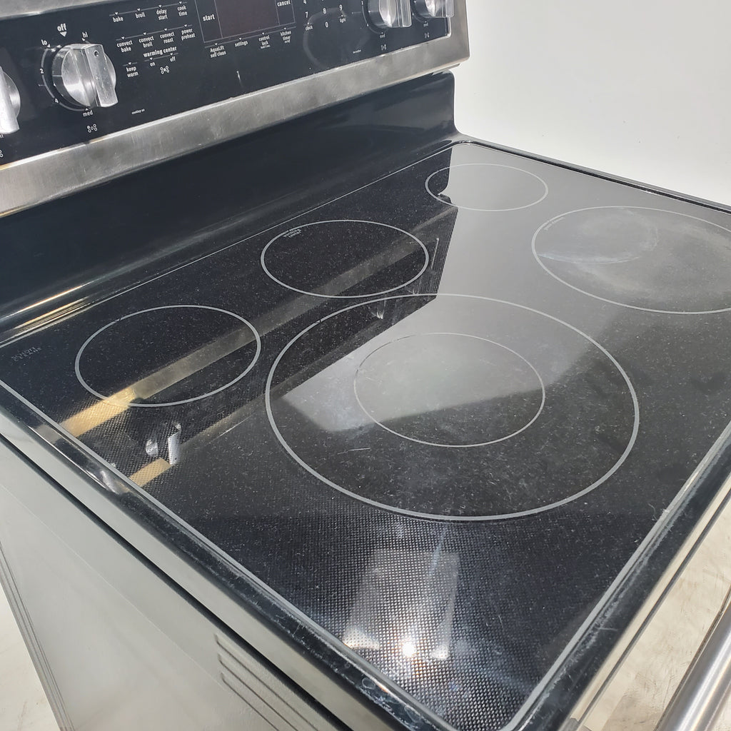 Pictures of Fingerprint-Resistant Stainless Steel Maytag 6.4 cu. ft. Freestanding 5 Heating Elements Smooth Cooktop Electric Range with Convection - Certified Refurbished - Neu Appliance Outlet - Discount Appliance Outlet in Austin, Tx
