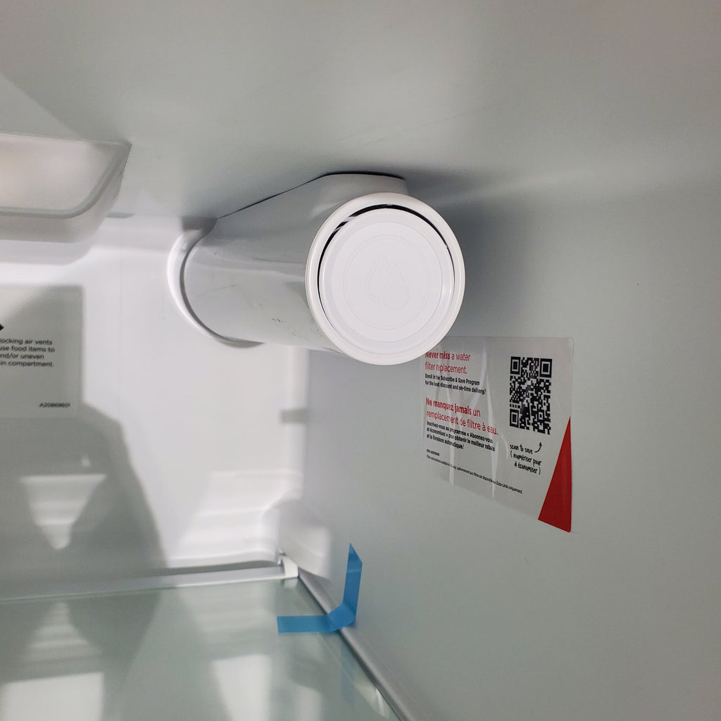 Pictures of 33" Wide Stainless Steel Frigidaire 22.3 cu. ft. ENERGY STAR Side by Side Refrigerator with Exterior Water and Ice Dispenser - Scratch & Dent - Minor - Neu Appliance Outlet - Discount Appliance Outlet in Austin, Tx