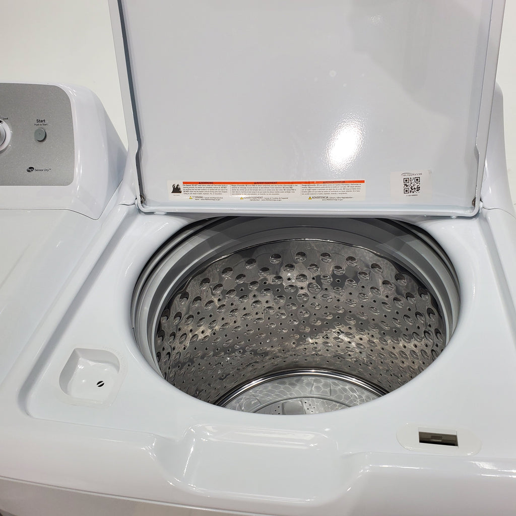 Pictures of ENERGY STAR GE 4.6 cu. ft. Top Load Washing Machine with Stainless Steel Basket and 7.2 cu. ft. Electric Dryer with HE Sensor Dry - Scratch & Dent - Minor - Neu Appliance Outlet - Discount Appliance Outlet in Austin, Tx