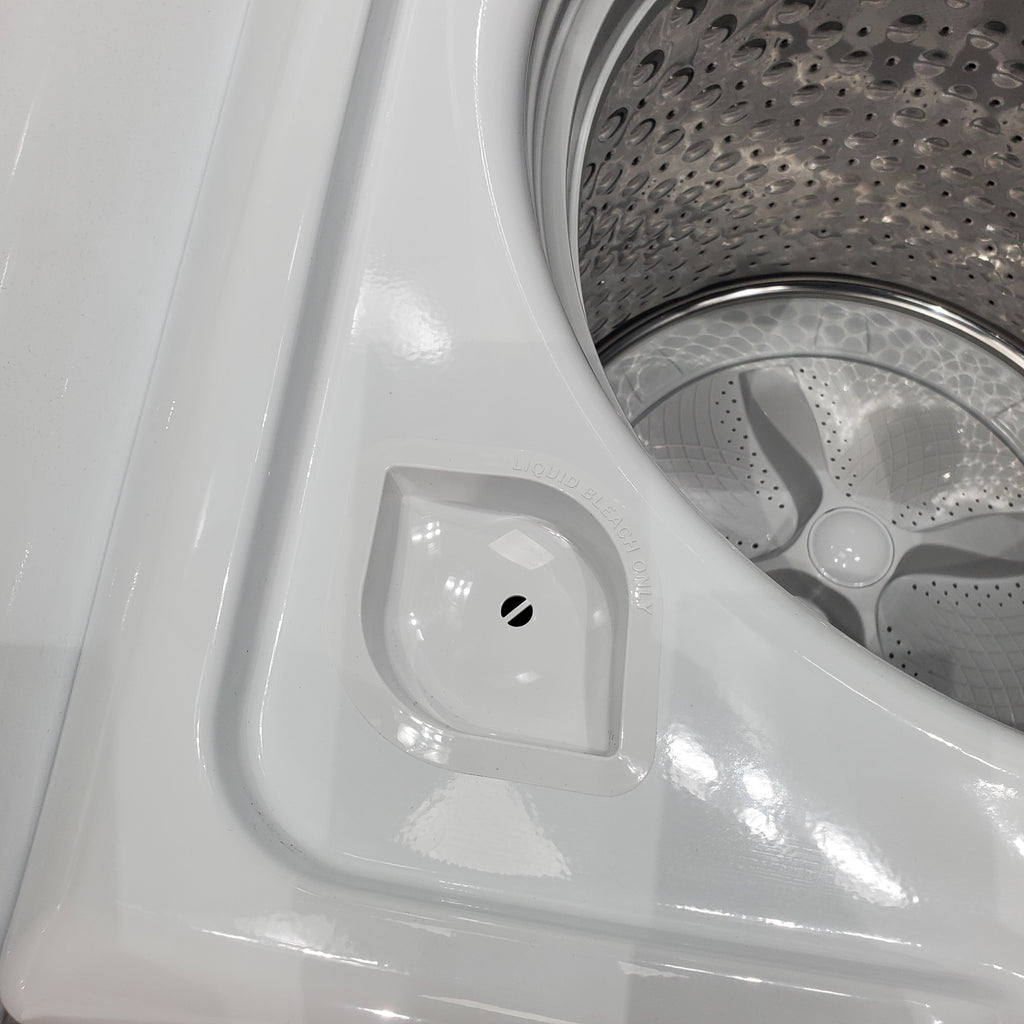 Pictures of ENERGY STAR GE 4.6 cu. ft. Top Load Washing Machine with Stainless Steel Basket and 7.2 cu. ft. Electric Dryer with HE Sensor Dry - Scratch & Dent - Minor - Neu Appliance Outlet - Discount Appliance Outlet in Austin, Tx