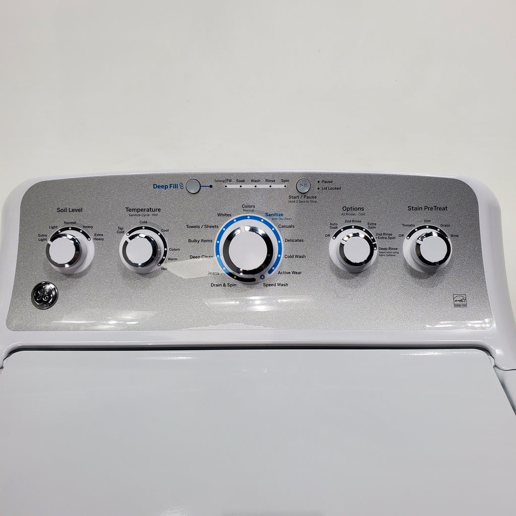 Pictures of ENERGY STAR GE 4.6 cu. ft. Top Load Washing Machine with Stainless Steel Basket and 7.2 cu. ft. Electric Dryer with HE Sensor Dry - Scratch & Dent - Minor - Neu Appliance Outlet - Discount Appliance Outlet in Austin, Tx