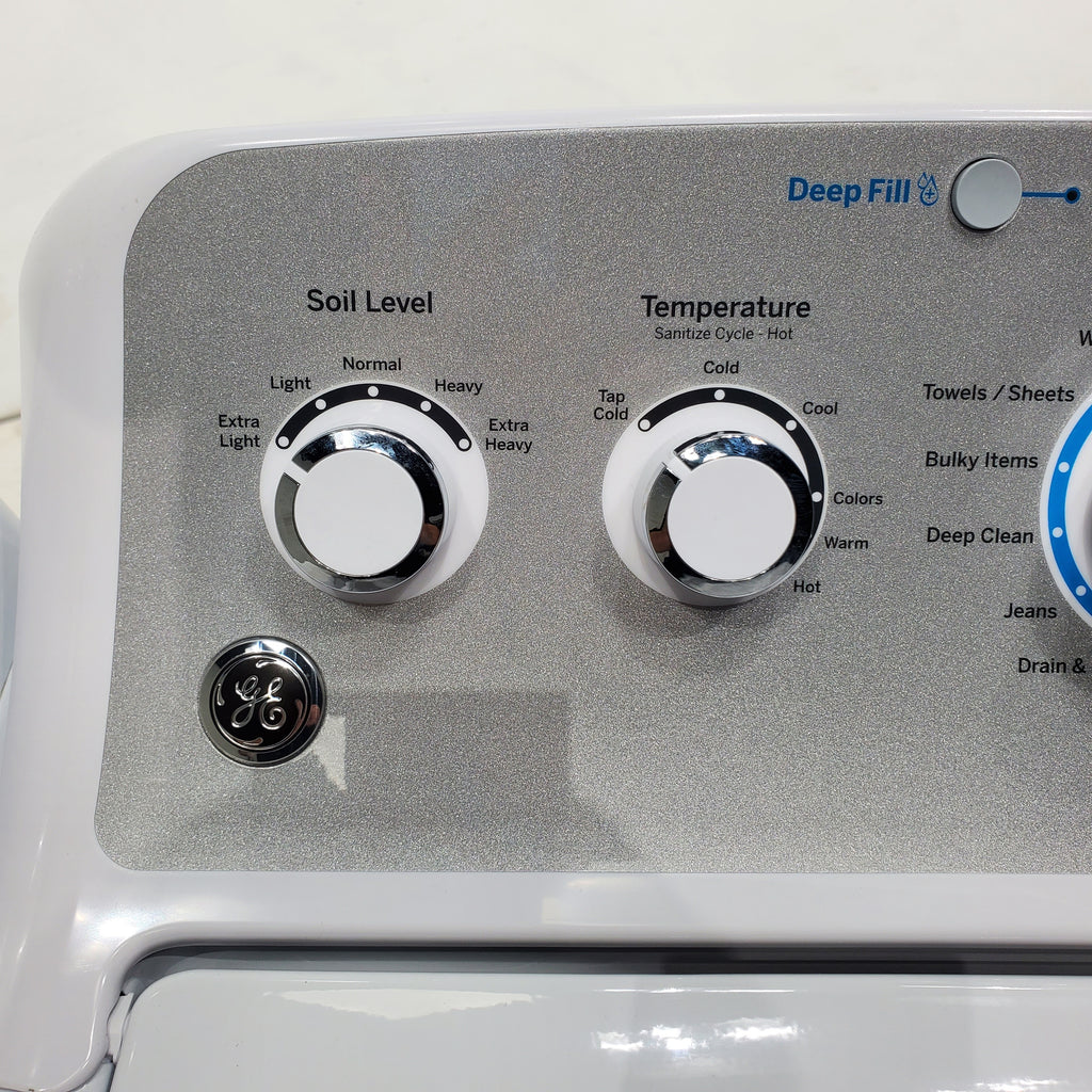 Pictures of ENERGY STAR GE 4.6 cu. ft. Top Load Washing Machine with Stainless Steel Basket and 7.2 cu. ft. Electric Dryer with HE Sensor Dry - Scratch & Dent - Minor - Neu Appliance Outlet - Discount Appliance Outlet in Austin, Tx