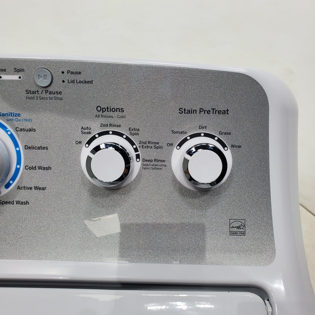 Pictures of ENERGY STAR GE 4.6 cu. ft. Top Load Washing Machine with Stainless Steel Basket and 7.2 cu. ft. Electric Dryer with HE Sensor Dry - Scratch & Dent - Minor - Neu Appliance Outlet - Discount Appliance Outlet in Austin, Tx