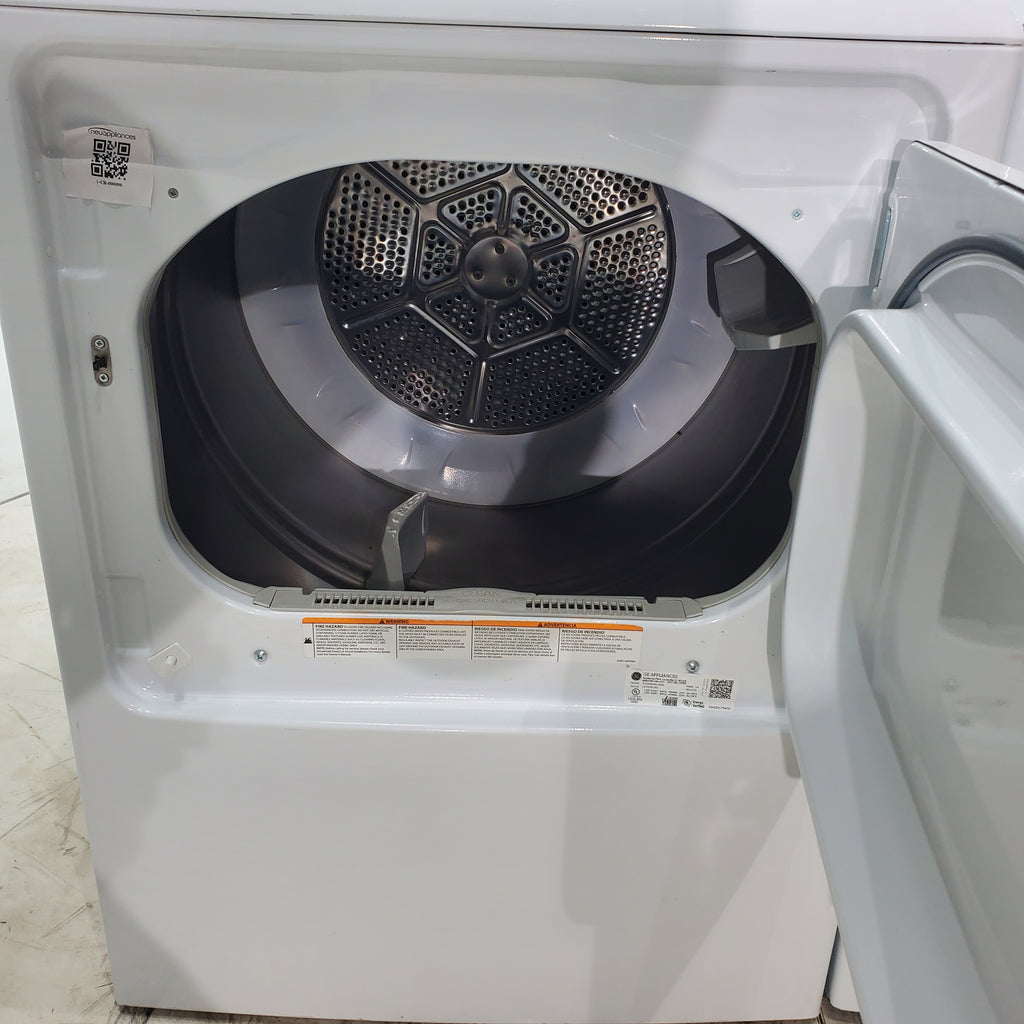 Pictures of ENERGY STAR GE 4.6 cu. ft. Top Load Washing Machine with Stainless Steel Basket and 7.2 cu. ft. Electric Dryer with HE Sensor Dry - Scratch & Dent - Minor - Neu Appliance Outlet - Discount Appliance Outlet in Austin, Tx