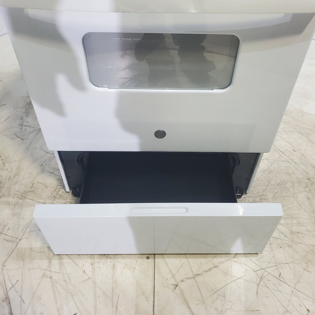 Pictures of White GE 5.0 cu. ft. Freestanding 4 Heating Element Electric Range with Dual Element Bake - Scratch & Dent - Major - Neu Appliance Outlet - Discount Appliance Outlet in Austin, Tx