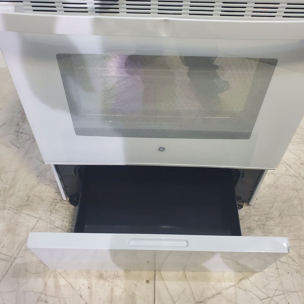 Pictures of White GE 5.0 cu. ft. Freestanding 4 Heating Element Electric Range with Dual Element Baking - Scratch & Dent - Minor - Neu Appliance Outlet - Discount Appliance Outlet in Austin, Tx