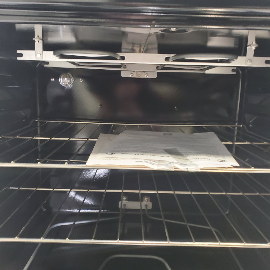 Pictures of White GE 5.3 cu. ft. 4 Element Freestanding Electric Range with Dual Element Baking - Scratch & Dent - Minor - Neu Appliance Outlet - Discount Appliance Outlet in Austin, Tx