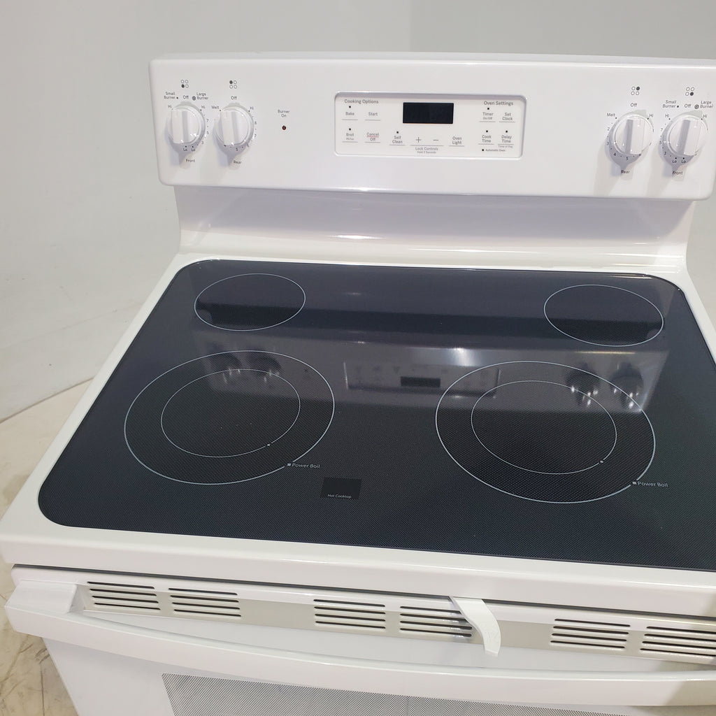 Pictures of White GE 5.3 cu. ft. 4 Element Freestanding Electric Range with Dual Element Baking - Scratch & Dent - Minor - Neu Appliance Outlet - Discount Appliance Outlet in Austin, Tx