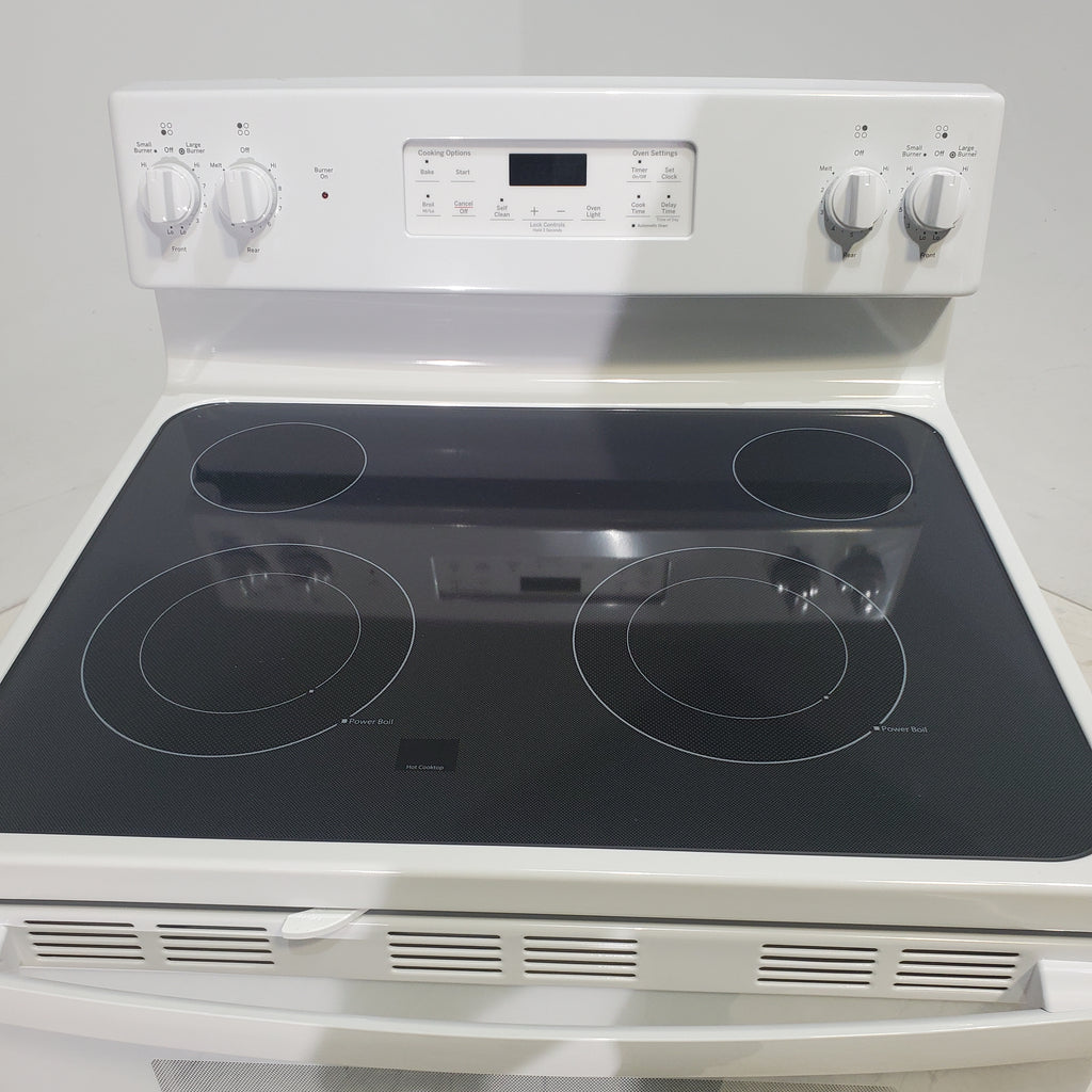 Pictures of White GE 5.3 cu. ft. 4 Element Freestanding Electric Range with Dual Element Baking - Scratch & Dent - Minor - Neu Appliance Outlet - Discount Appliance Outlet in Austin, Tx
