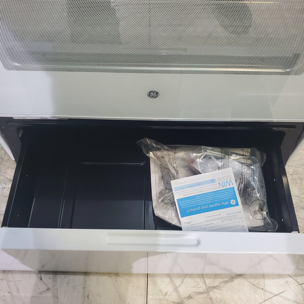 Pictures of White GE 5.3 cu. ft. 4 Element Freestanding Electric Range with Dual Element Baking - Scratch & Dent - Minor - Neu Appliance Outlet - Discount Appliance Outlet in Austin, Tx