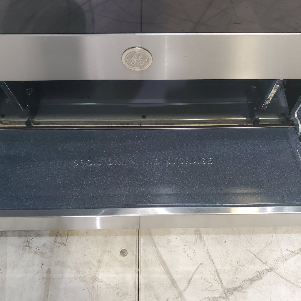 Pictures of Stainless Steel GE 5.0 cu. ft. Freestanding 5 Burner Gas Range with Cast-Iron Grates - Scratch & Dent - Minor - Neu Appliance Outlet - Discount Appliance Outlet in Austin, Tx