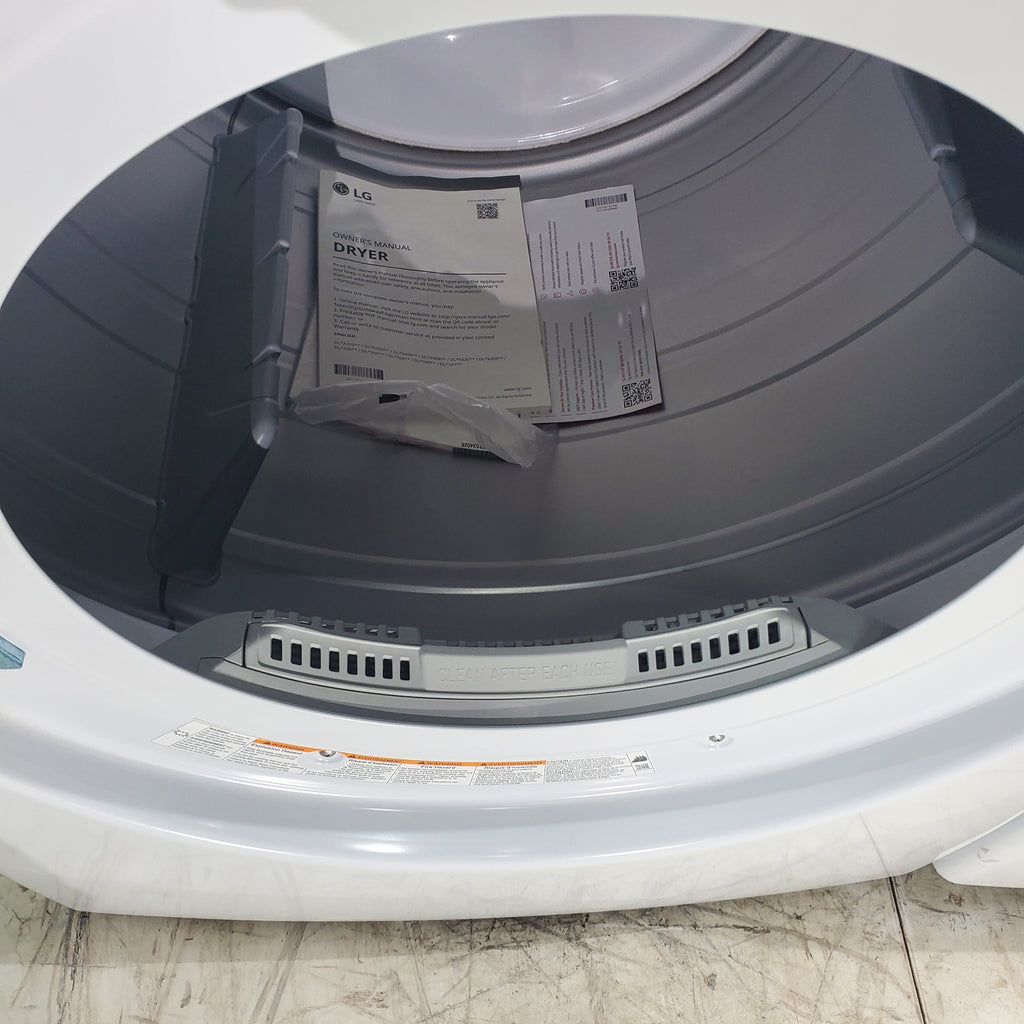 Pictures of ENERGY STAR LG 4.5 cu. ft. Front Load Washer with LG 6Motion Technology and ENERGY STAR LG 7.4 cu. ft. Electric Vented Dryer with Sensor Dry and SmartThinQ Technology - Open Box - Neu Appliance Outlet - Discount Appliance Outlet in Austin, Tx