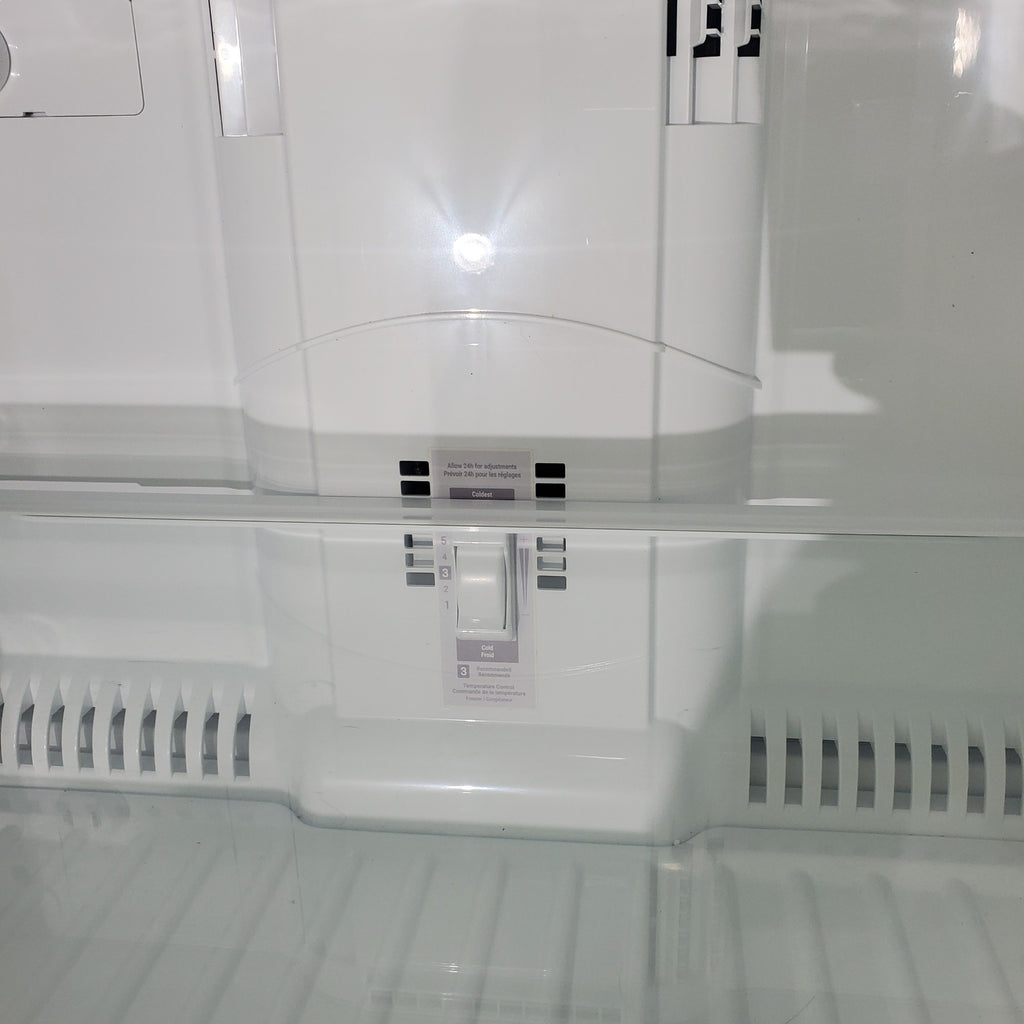 Pictures of 30" Wide Stainless Steel ENERGY STAR LG 20.2 cu. ft. Top Freezer Refrigerator with Reversible Door - Scratch and Dent - Moderate - Neu Appliance Outlet - Discount Appliance Outlet in Austin, Tx