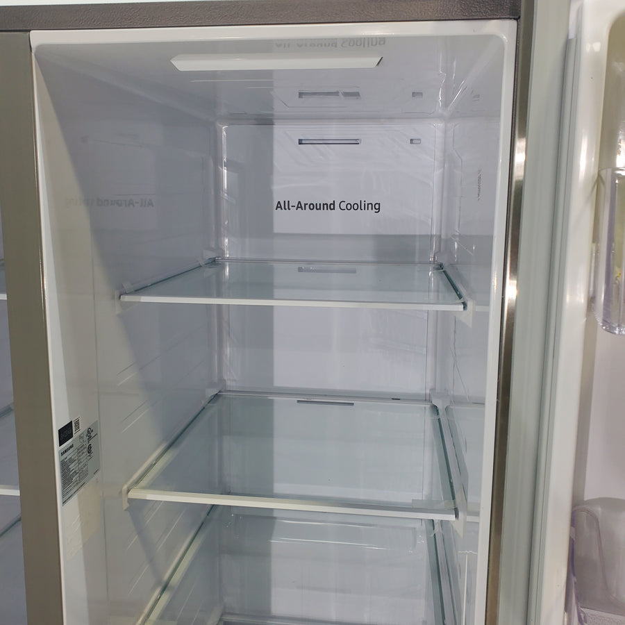Fingerprint Resistant Stainless Steel ENERGY STAR Samsung 27.4 cu. ft. Side by Side Refrigerator with Exterior Water and Ice Dispenser - Scratch & Dent - Minor