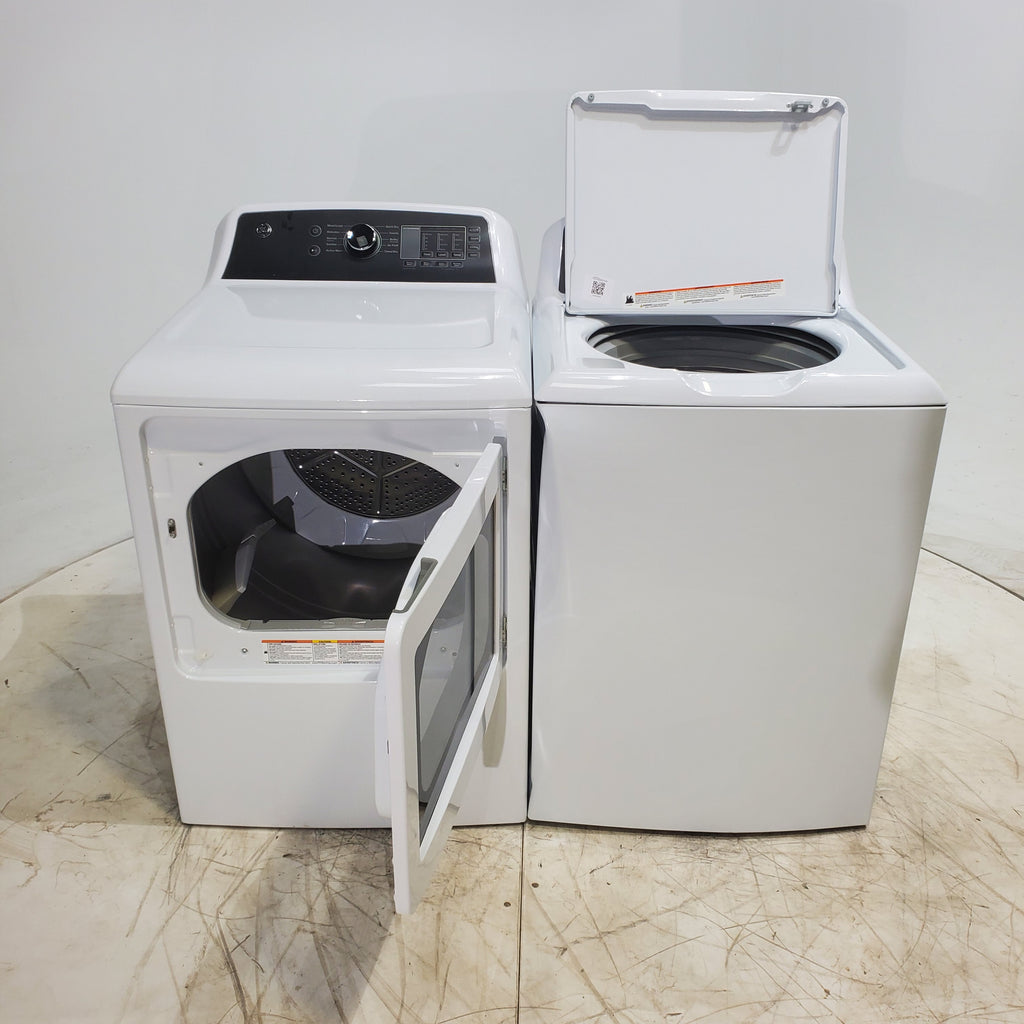 Pictures of GE 4.5 cu. ft. Capacity Washer with Stainless Steel Basket, Cold Plus and Wash Boost and GE 7.4 cu. ft. Capacity Electric Dryer with Up To 120 ft. Venting and Sensor Dry - Scratch & Dent - Minor | Moderate - Neu Appliance Outlet - Discount Appliance Outlet in Austin, Tx