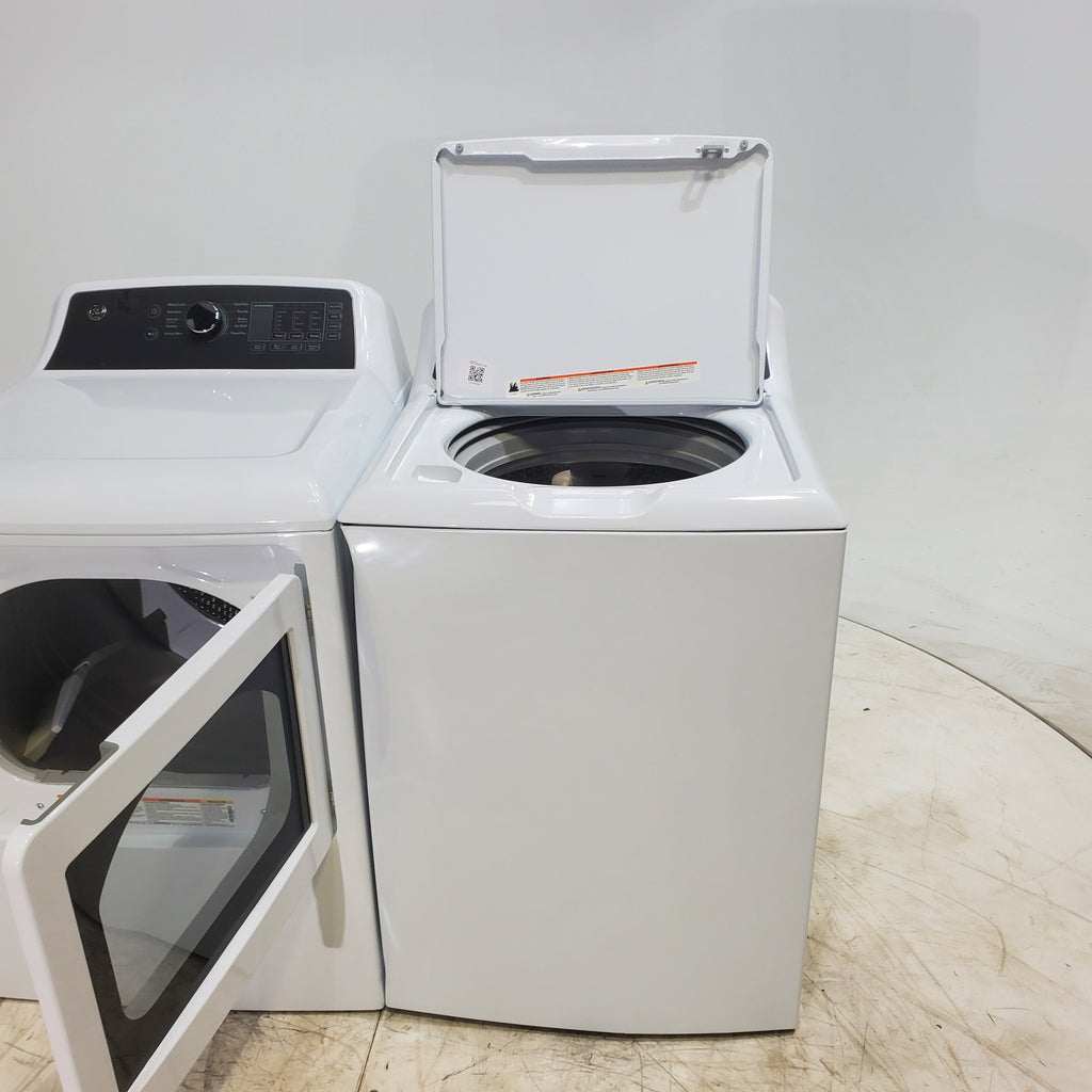 Pictures of GE 4.5 cu. ft. Capacity Washer with Stainless Steel Basket, Cold Plus and Wash Boost and GE 7.4 cu. ft. Capacity Electric Dryer with Up To 120 ft. Venting and Sensor Dry - Scratch & Dent - Minor | Moderate - Neu Appliance Outlet - Discount Appliance Outlet in Austin, Tx