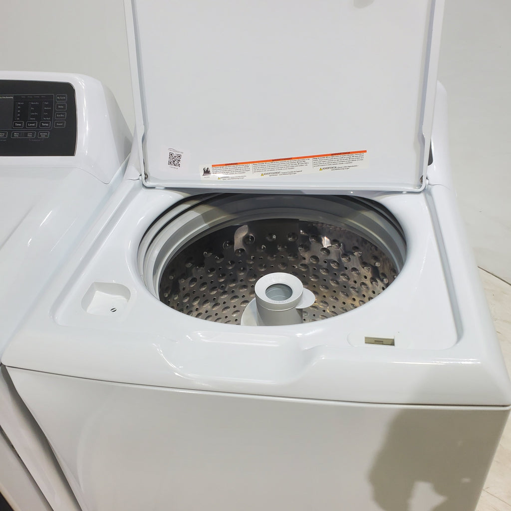 Pictures of GE 4.5 cu. ft. Capacity Washer with Stainless Steel Basket, Cold Plus and Wash Boost and GE 7.4 cu. ft. Capacity Electric Dryer with Up To 120 ft. Venting and Sensor Dry - Scratch & Dent - Minor | Moderate - Neu Appliance Outlet - Discount Appliance Outlet in Austin, Tx