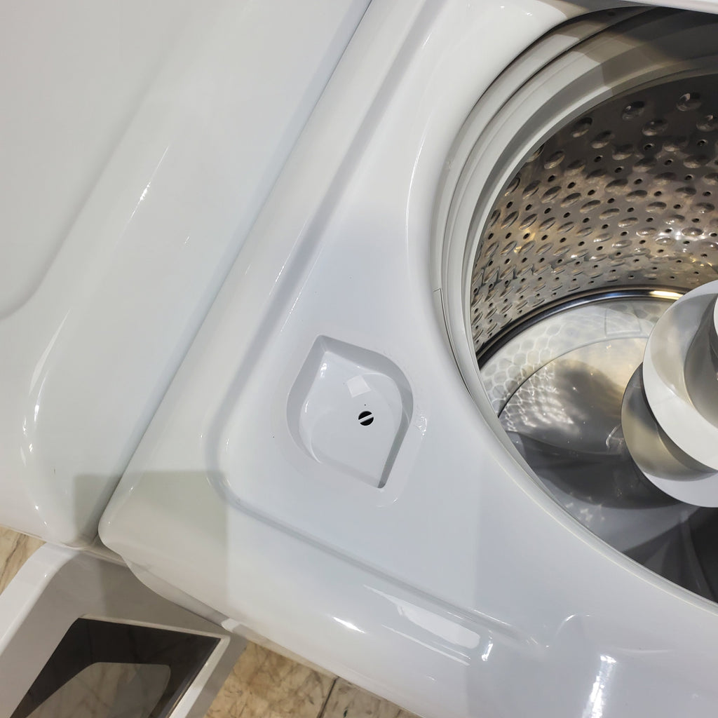 Pictures of GE 4.5 cu. ft. Capacity Washer with Stainless Steel Basket, Cold Plus and Wash Boost and GE 7.4 cu. ft. Capacity Electric Dryer with Up To 120 ft. Venting and Sensor Dry - Scratch & Dent - Minor | Moderate - Neu Appliance Outlet - Discount Appliance Outlet in Austin, Tx