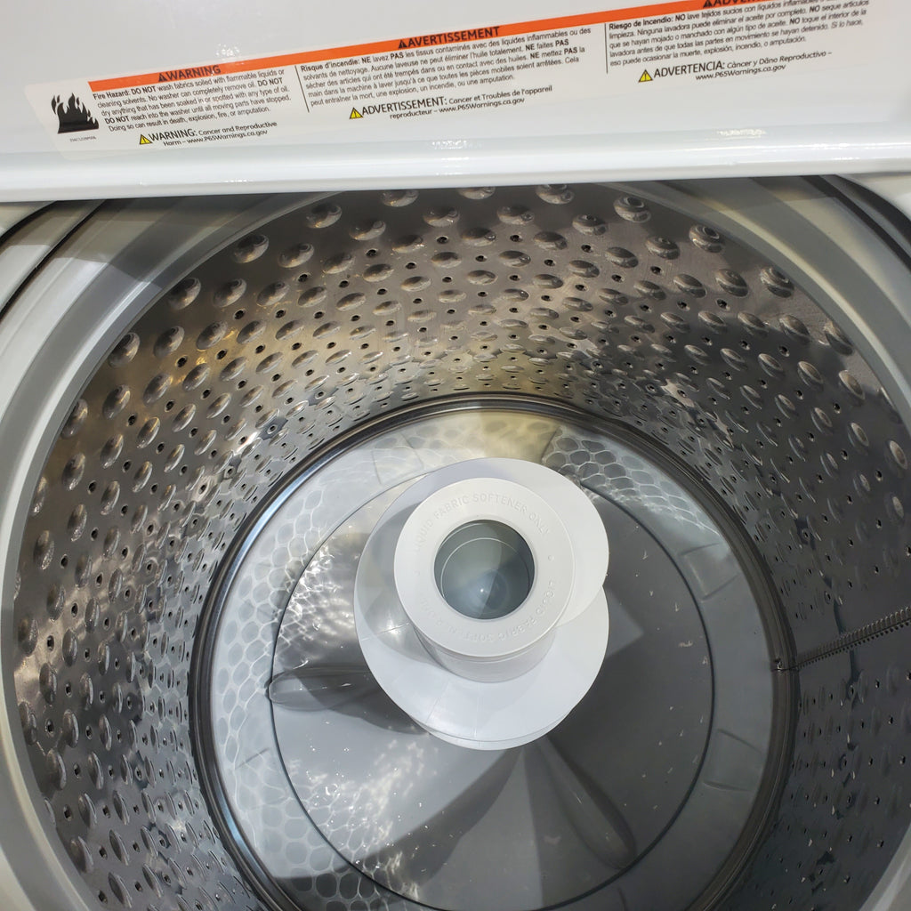 Pictures of GE 4.5 cu. ft. Capacity Washer with Stainless Steel Basket, Cold Plus and Wash Boost and GE 7.4 cu. ft. Capacity Electric Dryer with Up To 120 ft. Venting and Sensor Dry - Scratch & Dent - Minor | Moderate - Neu Appliance Outlet - Discount Appliance Outlet in Austin, Tx