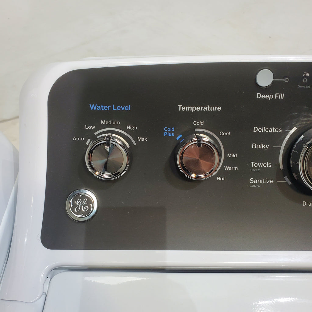 Pictures of GE 4.5 cu. ft. Capacity Washer with Stainless Steel Basket, Cold Plus and Wash Boost and GE 7.4 cu. ft. Capacity Electric Dryer with Up To 120 ft. Venting and Sensor Dry - Scratch & Dent - Minor | Moderate - Neu Appliance Outlet - Discount Appliance Outlet in Austin, Tx