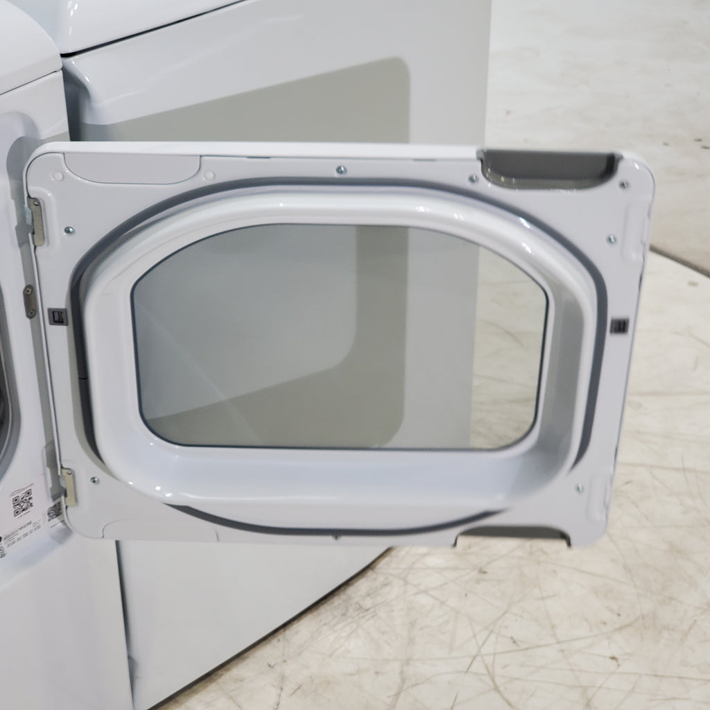 Pictures of GE 4.5 cu. ft. Capacity Washer with Stainless Steel Basket, Cold Plus and Wash Boost and GE 7.4 cu. ft. Capacity Electric Dryer with Up To 120 ft. Venting and Sensor Dry - Scratch & Dent - Minor | Moderate - Neu Appliance Outlet - Discount Appliance Outlet in Austin, Tx