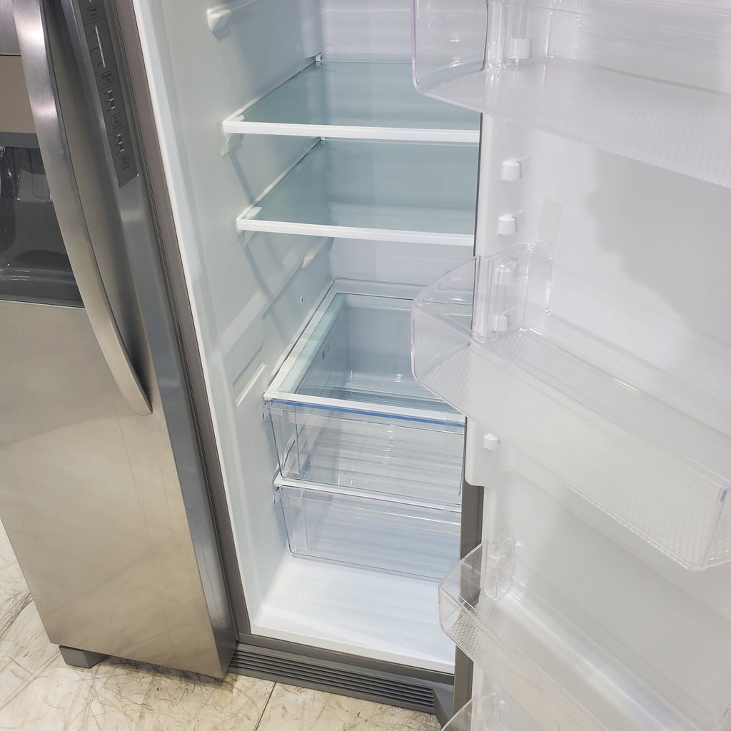 Pictures of Stainless Steel ENERGY STAR Frigidaire 25.6 cu. ft. Side by Side Refrigerator with Exterior Water and Ice Dispenser - Scratch & Dent - Minor - Neu Appliance Outlet - Discount Appliance Outlet in Austin, Tx