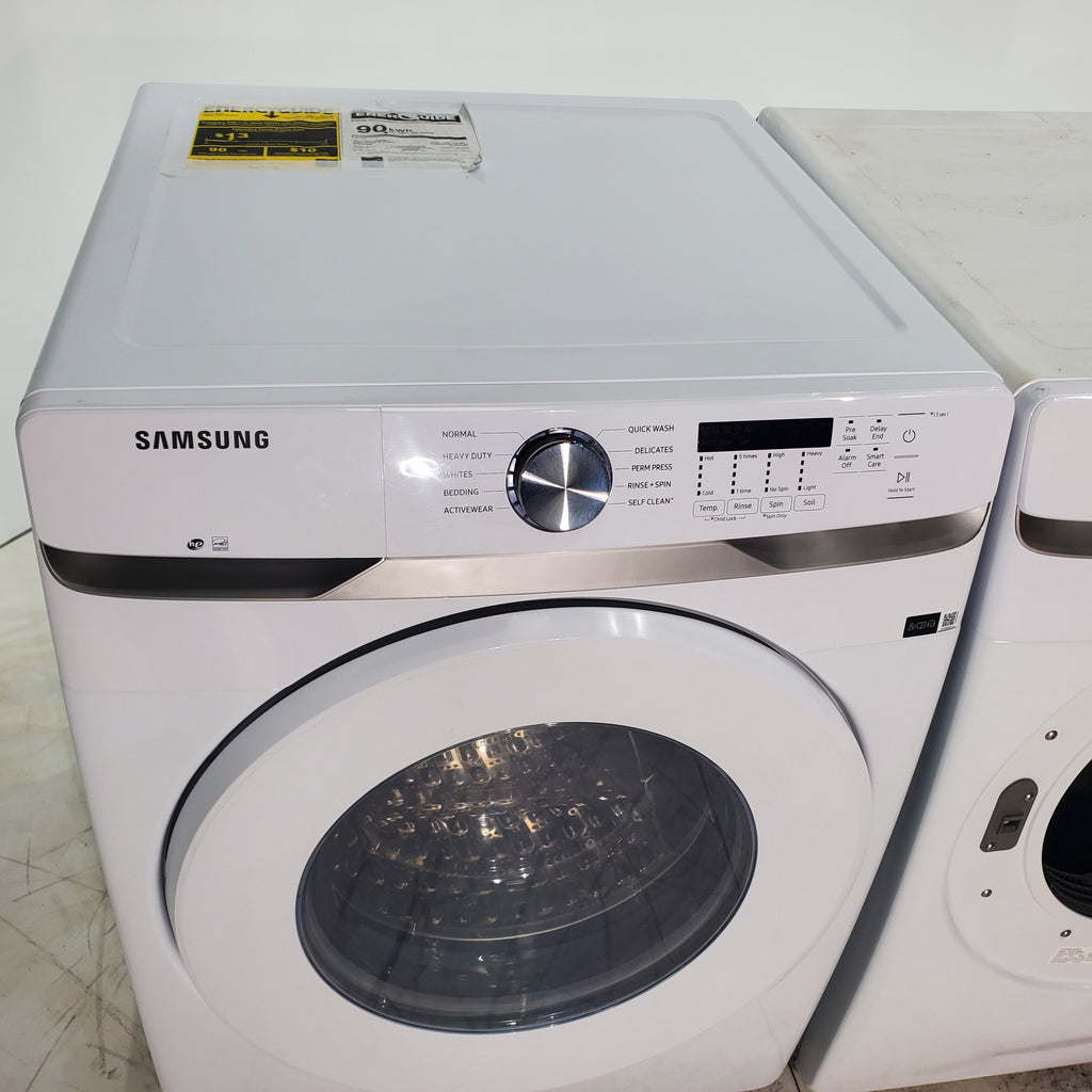 Pictures of ENERGY STAR Samsung 4.5 cu. ft. Front Load Washer with Vibration Reduction and Samsung 7.5 cu. ft. Front Load Electric Dryer with Sensor Dry and Interior Drum Light- Scratch & Dent - Moderate | Major - Neu Appliance Outlet - Discount Appliance Outlet in Austin, Tx
